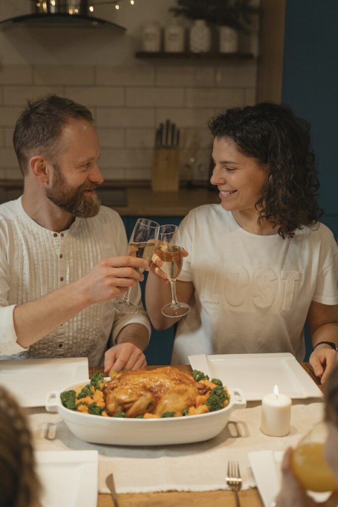 A Man and a Woman Toasting Glasses